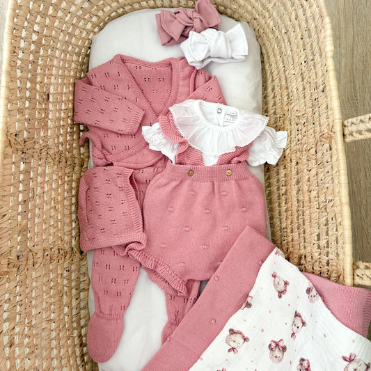 Pagliaccetto neonato in cotone pompon con voulant