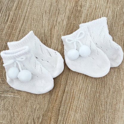 Calzino neonato pompon