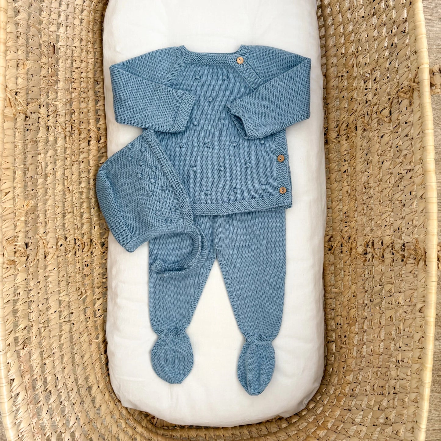 Completino neonato pompon con cuffietta