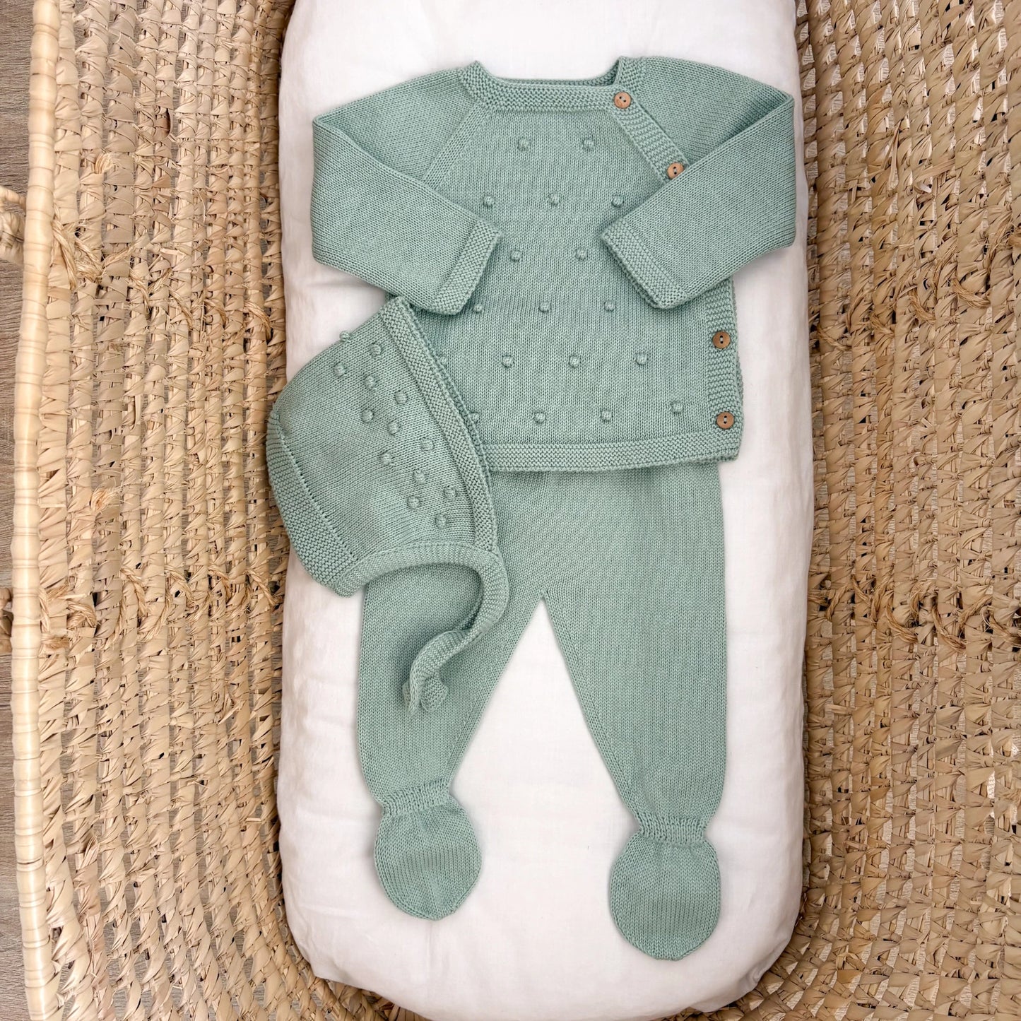 Completino neonato pompon con cuffietta