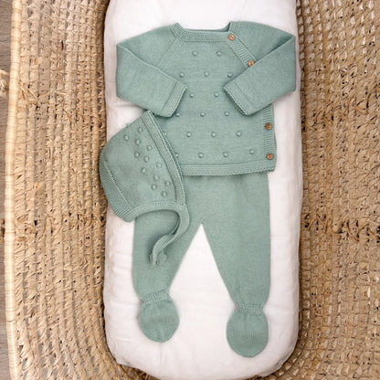 Completino neonato pompon con cuffietta
