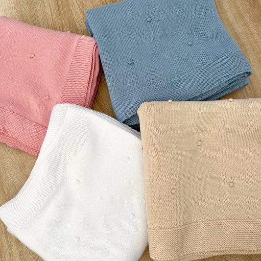 Copertina neonato in cotone pompon